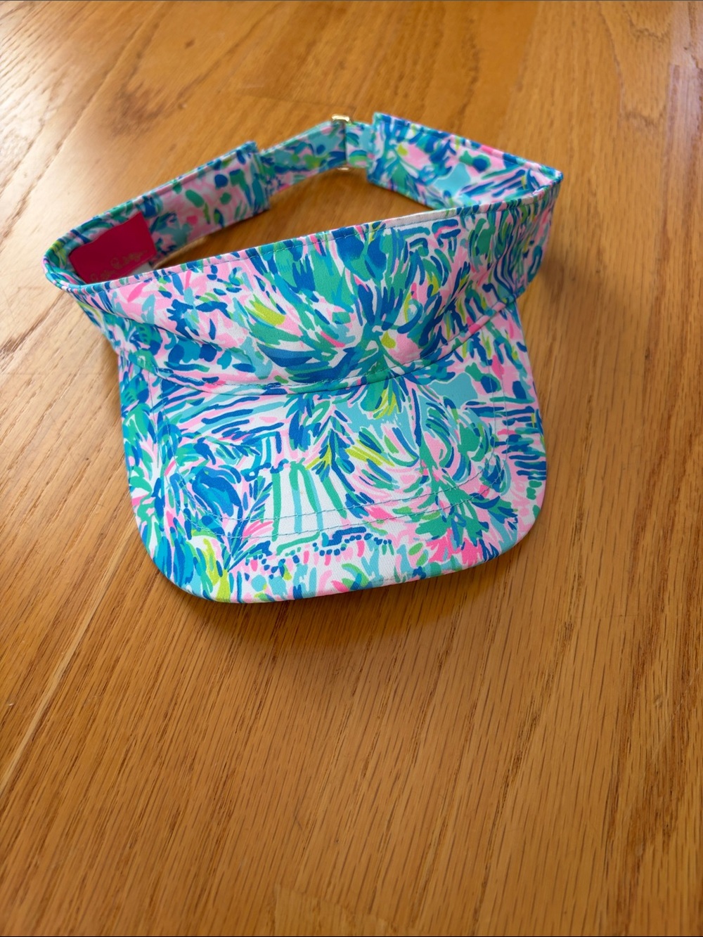 Lilly Pulitzer it’s a match visor in Ibiza blue cabana cocktail